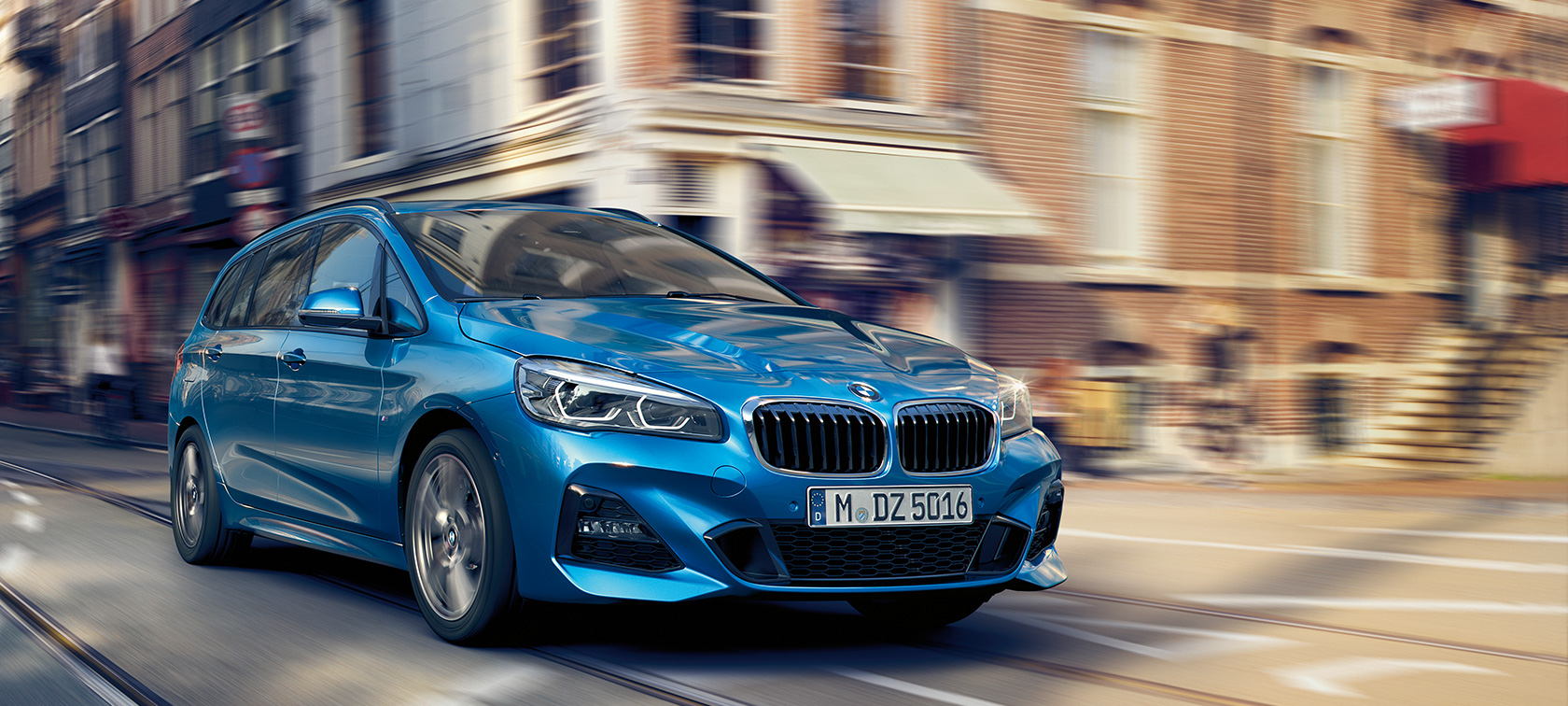 BMW 2 Series Gran Tourer F46 2018 Estoril Blue metallic three-quarter front view driving on the road